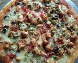 A picture of step 4 of Chicken tikka pizza.