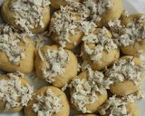 A picture of step 5 of Baked dougnut with coconut iced.