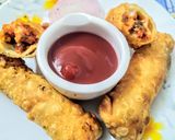 A picture of step 3 of Tandoori chicken cigars.