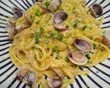 Foto del passaggio 10 della ricetta Linguine con vongole (lupini) e pomodorini gialli