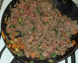 Foto del paso 3 de la receta: Calabacitas rellenas con carne y verduras