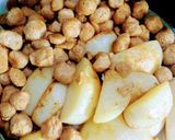 A picture of step 1 of Aalu soyabean pulav.