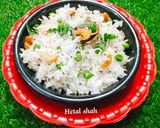 A picture of step 4 of Jeera Matar Pulao (Cumin Pea Rice).