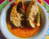 A picture of step 4 of Narkel Shorse Ilish bhapa.