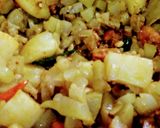 A picture of step 4 of Lau aloo chingri / bottle gourd potato & shrimp curry.