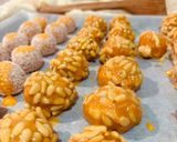 A picture of step 13 of “PANELLETS” (sweet potato balls made with coconut, pine nuts, or almonds).