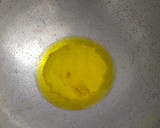 A picture of step 1 of Ven Pongal (Khara Pongal).