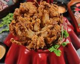 A picture of step 5 of Blooming Onion with Dipping Sauce.