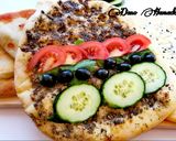 A picture of step 11 of Manaich zaater (thyme) & cheese, Lebanese pizza,.