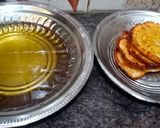 A picture of step 10 of Malpua with rabdi.
