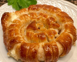Foto del paso 9 de la receta: Espiral de hojaldre rellena de queso