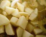 Foto del paso 6 de la receta Guiso de bacalao, calamares y langostinos