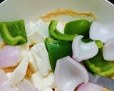 A picture of step 2 of Paneer tikka masala in paalak gravy.