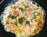A picture of step 3 of Fluffy, Butter Omelette 😋😋.