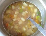 A picture of step 4 of Daliya upma.