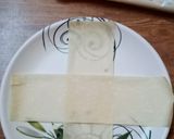 A picture of step 3 of Makhni chicken parcel.