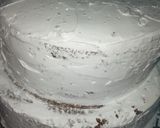 A picture of step 14 of Two tier vanilla and chocolate cake 🎂.