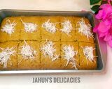 A picture of step 4 of Basbousa Semovita/Semolina Cake.