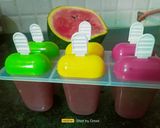 A picture of step 2 of Watermelon Ice Popsicles.