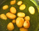 A picture of step 5 of Hariyali Dum Aloo.