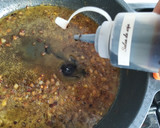 Foto del paso 3 de la receta: Muslos de pollo en salsa de soja y naranja