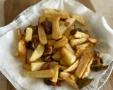 Foto del paso 4 de la receta: Patatas fritas con pimientos y ajos