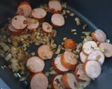 Une image de l'étape 1 de Rougail de saucisses fumées.