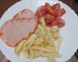Foto del paso 3 de la receta Lomo adobado con papas fritas y tomate aliñado