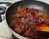 A picture of step 5 of Kerala style beetroot pickle.