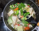 Foto langkah ke 5 dari resep Sup Pakcoy Kembang Tahu.