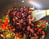 A picture of step 4 of Mexican Rice with Beans.