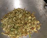 A picture of step 3 of Karela pyaz.