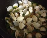 Foto del paso 9 de la receta Arroz con bogavante y almejas