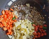 A picture of step 5 of Vegetable proso Millet one pot meal.