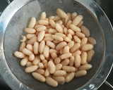 Foto del paso 2 de la receta: Merluza Rebozada con alubias al ajillo