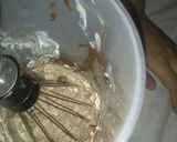 A picture of step 2 of 3 layers Oreo dessert.