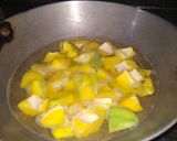 A picture of step 1 of Malabari Mango Kadhi.