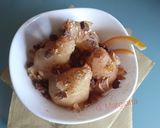 Foto del passaggio 4 della ricetta Pere cotte con marsala, frutta secca e cannella