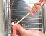 A picture of step 2 of Japanese yakitori (chicken thigh).