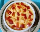 A picture of step 7 of Custard with apple cubes 🍎🍏🍎.