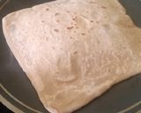 A picture of step 10 of Cheese stuffed paratha with smile emoji.