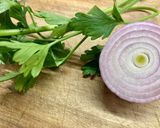 A picture of step 2 of Tomato, Parsley, and Onion Salad.