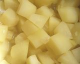 A picture of step 2 of Papaya Puli Kajipu.