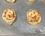 A picture of step 8 of Pizza roll ups.