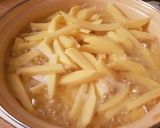 Foto del paso 2 de la receta: Patatas fritas con bacon y quesos