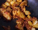 A picture of step 12 of Shaljam Gosht.