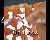 A picture of step 2 of Bread pizza.