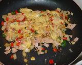 A picture of step 4 of Arepas with Scrambled Eggs and Ham.