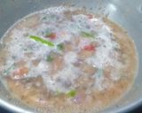 A picture of step 2 of Broken Wheat Upma.