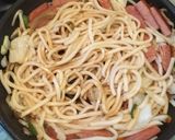 A picture of step 7 of Stir-Fried Udon with Spam and Mixed Vegetables.